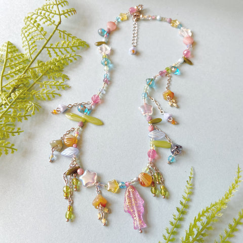 Coral-pink fish necklace