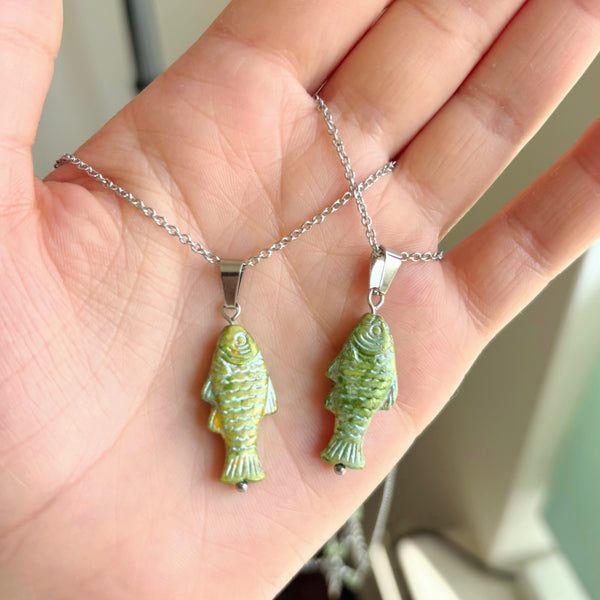 Fish pendant necklaces